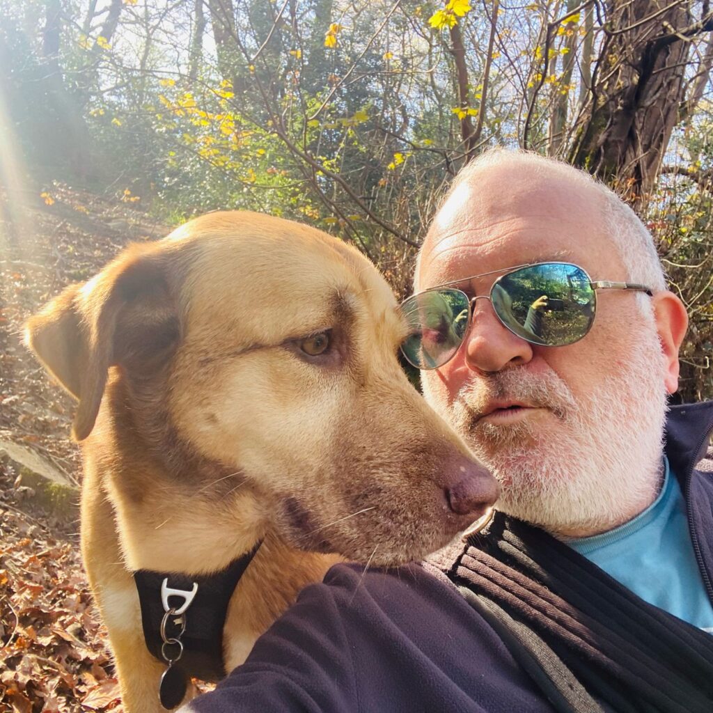 Photo of Julian and Nugget having a moment in the sunshine.